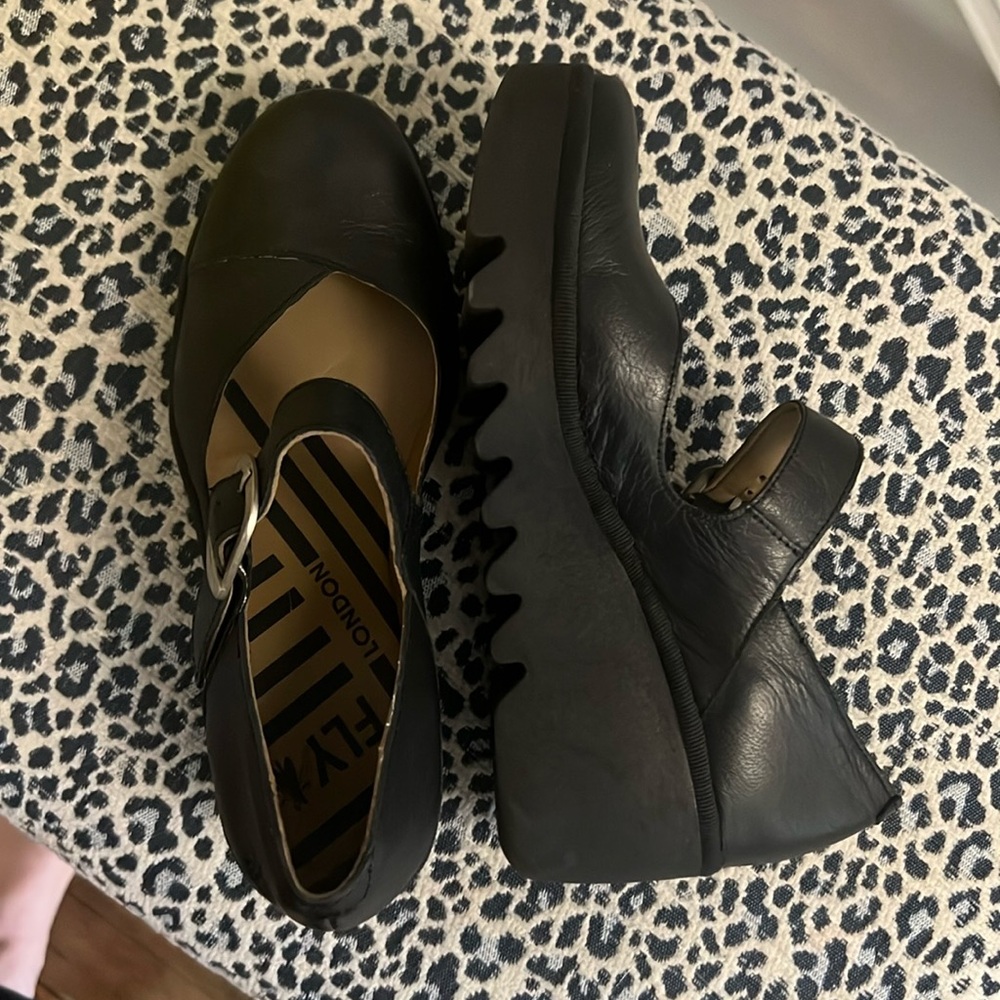 Mary Janes.  Black leather. Perfect condition